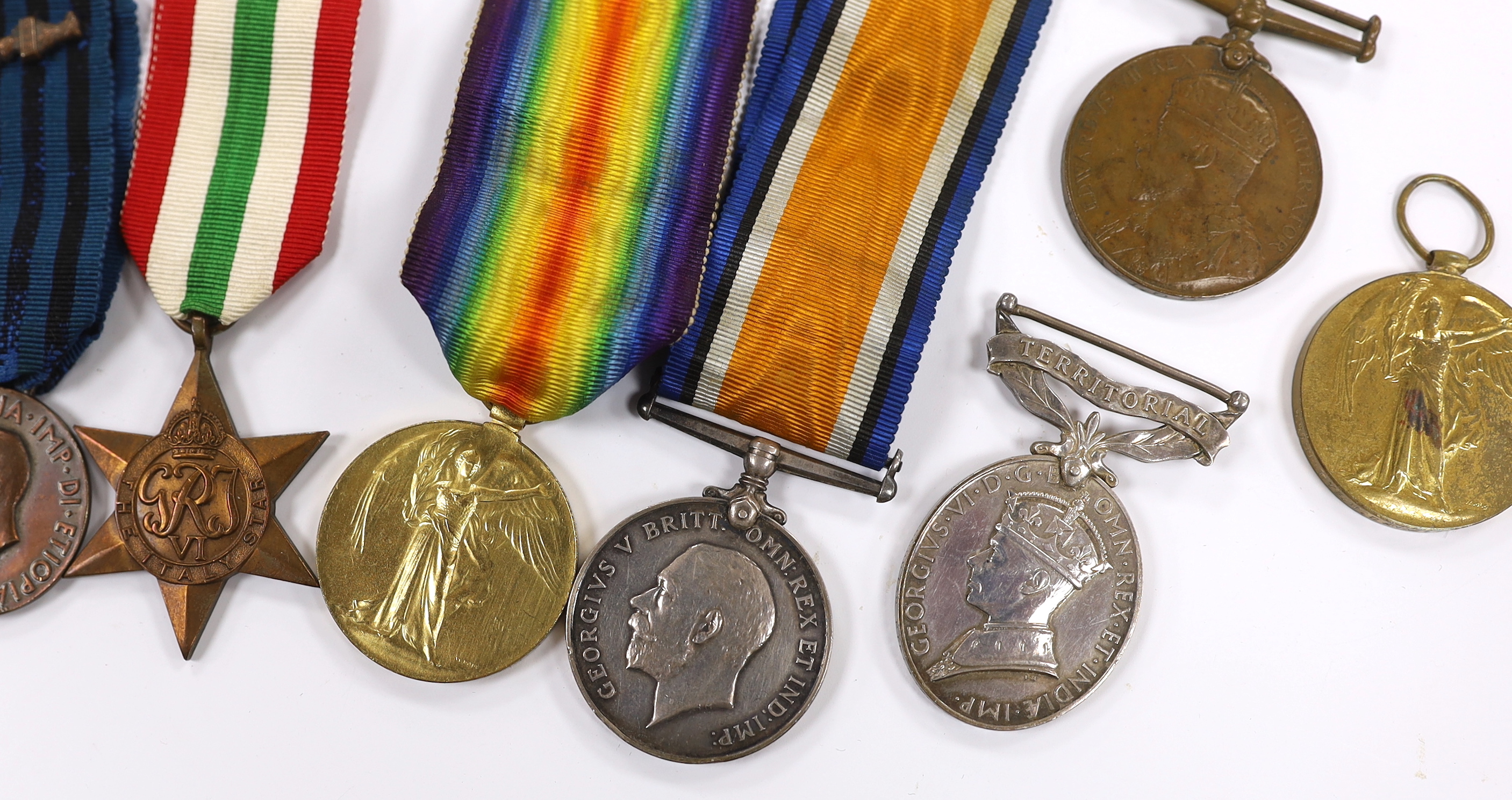Ten medals; two First World War pairs of the Victory medal and the British War medal to Pte. F.J. Pulham 24 London Reg. and Pte. H. Cannell M.G.C., three WWII medals; The Italy Star, The 1939-1945 Star and a 1939-1945 Wa